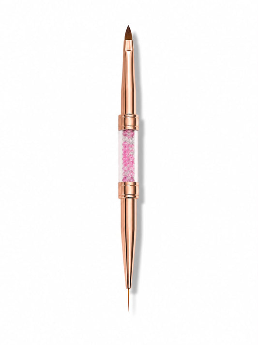 Pensula profesionala dubla pentru unghii de la Cosmeticos, finisaj de lux Rose Gold cu cristale roz. Dotata cu un capat lung Liner de 11mm pentru linii perfect drepte si un capat rotunjit Limba de Pisica (Oval) pentru aplicarea si modelarea fina a gelului de constructie.